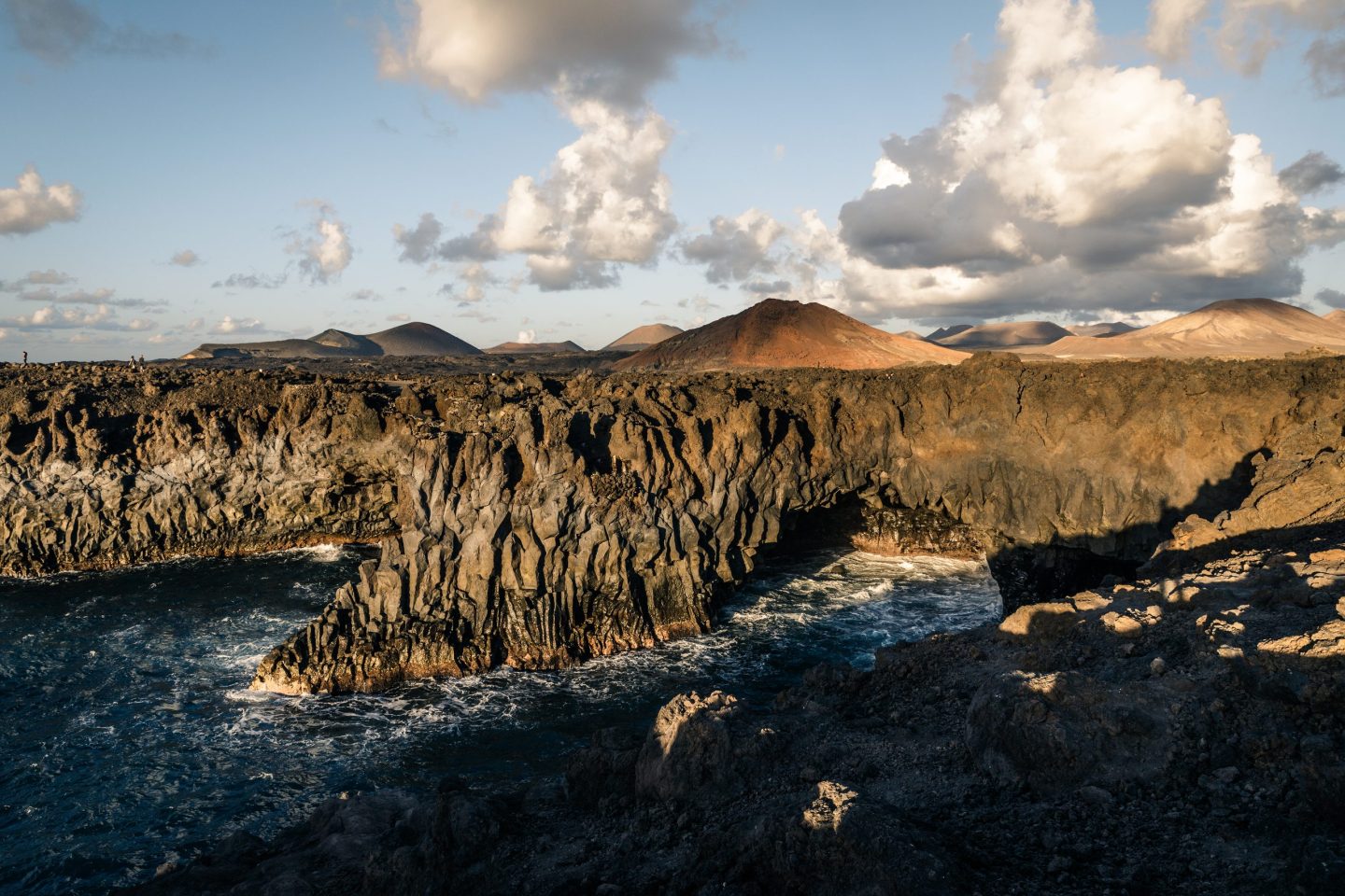 Lanzarote. Part III

Continuing our journey through Lanzarote’s southwestern volcanic coast, the landscape only becomes more dramatic as you follow the edge where ancient lava meets the relentless Atlantic. This stretch of the island feels raw, almost prehistoric—a place where the elements haven’t finished speaking to each other. Our late afternoon began at the iconic Charco de los Clicos (or Lago Verde), tucked inside a collapsed volcanic crater near El Golfo....

https://www.mercedescatalan.com/2026/10/26/lanzarote-part-iii/